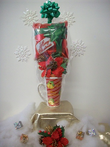 Christmas mug with poinsettia plant